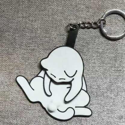 Playing with eggs and kitten keychain