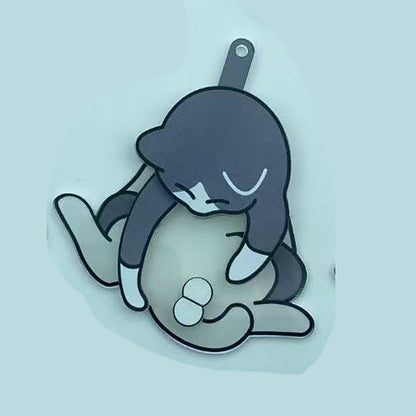 Playing with eggs and kitten keychain
