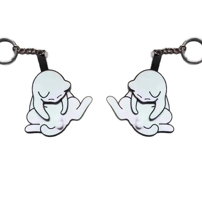 Playing with eggs and kitten keychain